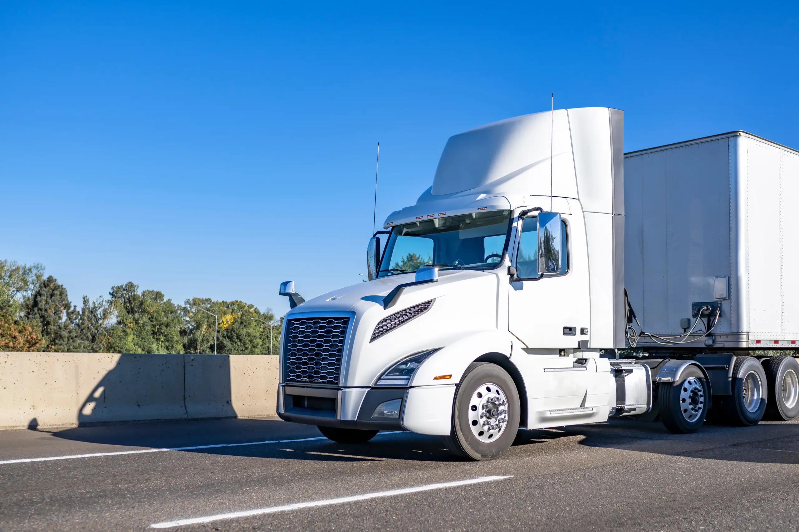 White day cab truck on highway